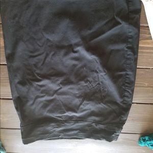 Two fitted business skirts. Pink and black